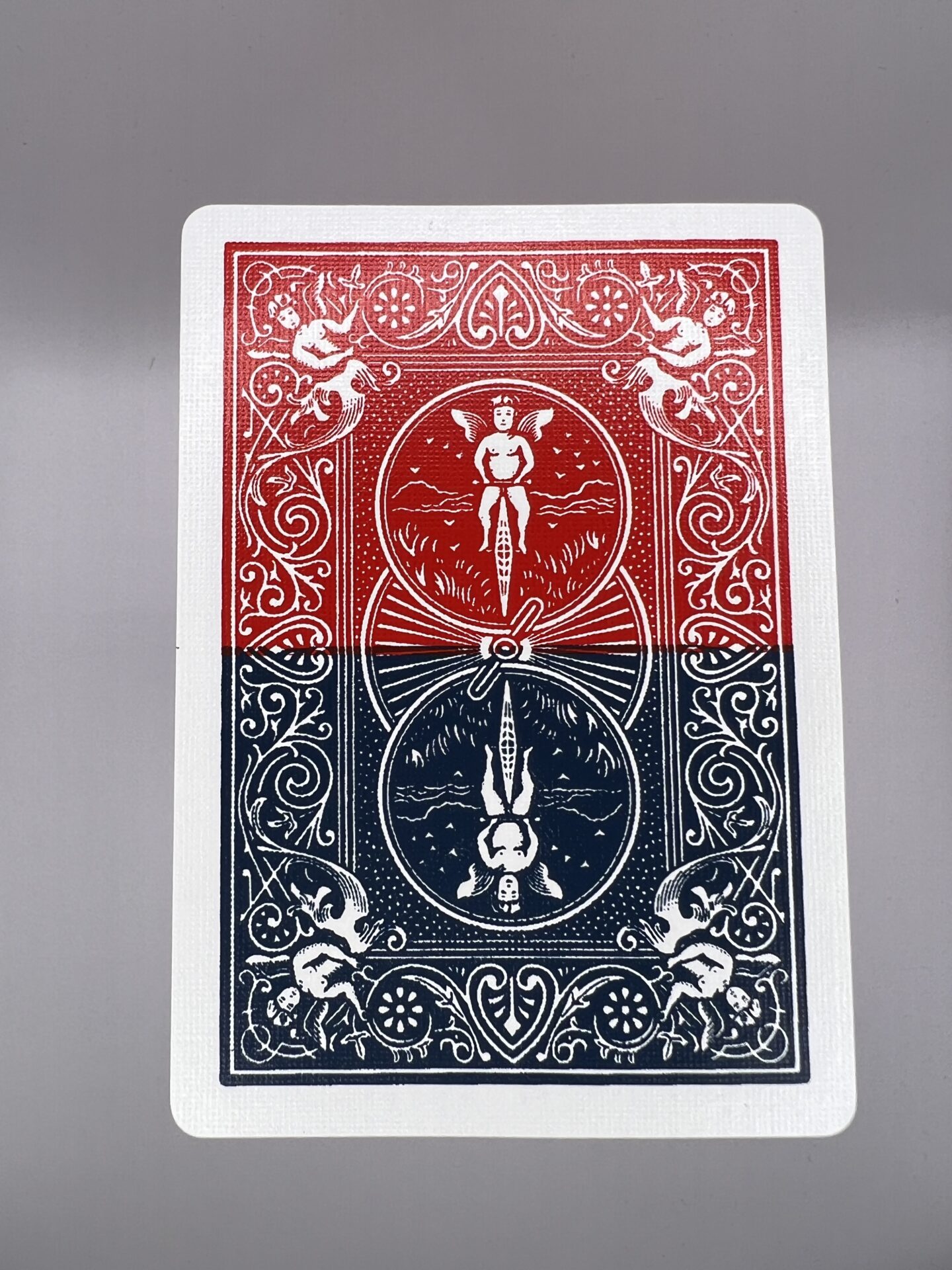 Half Red Half Blue Back Split gaff card printed on Bicycle stock